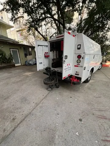 Magnet Plumbing service vehicle on-site for Water Heater Repair in Forty Acres
